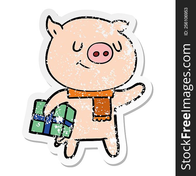 Distressed Sticker Of A Happy Cartoon Pig With Christmas Present
