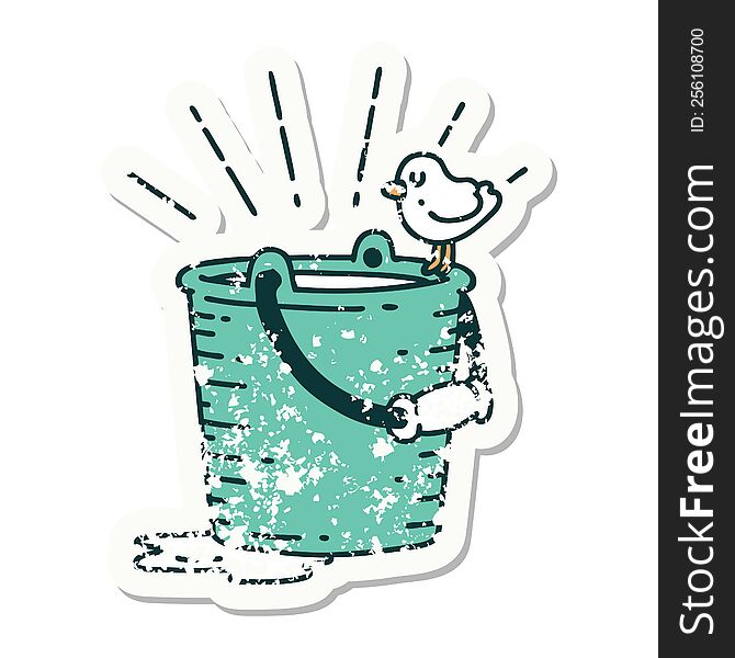 grunge sticker of tattoo style bird perched on bucket of water