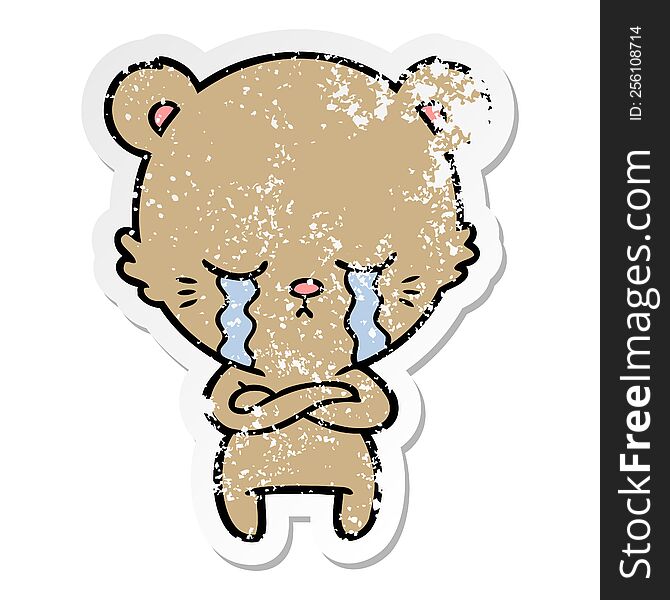 distressed sticker of a crying cartoon bear with folded arms