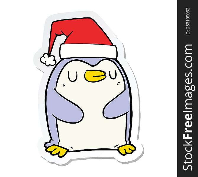 sticker of a cartoon penguin wearing christmas hat