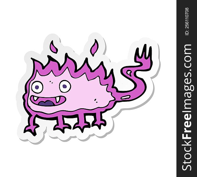 sticker of a cartoon little fire demon
