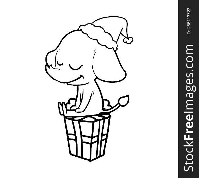 hand drawn line drawing of a smiling elephant wearing santa hat