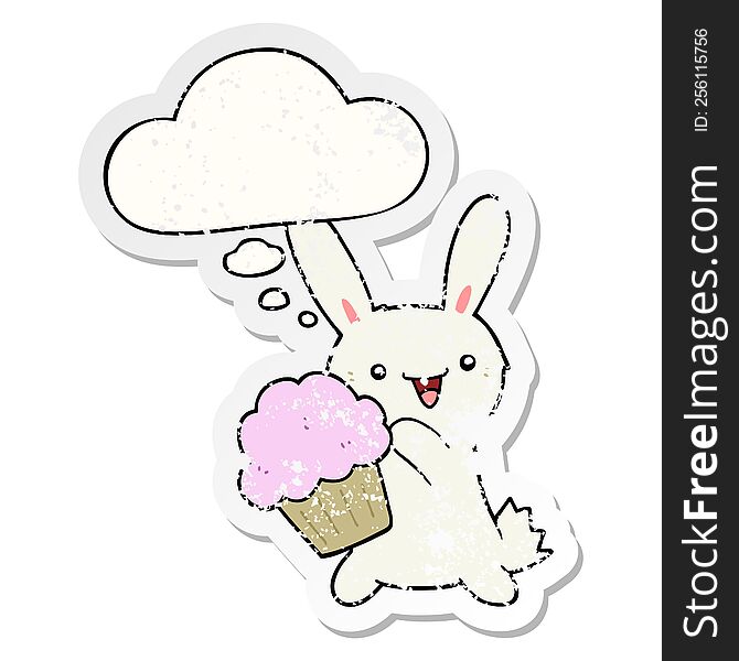cute cartoon rabbit with muffin with thought bubble as a distressed worn sticker