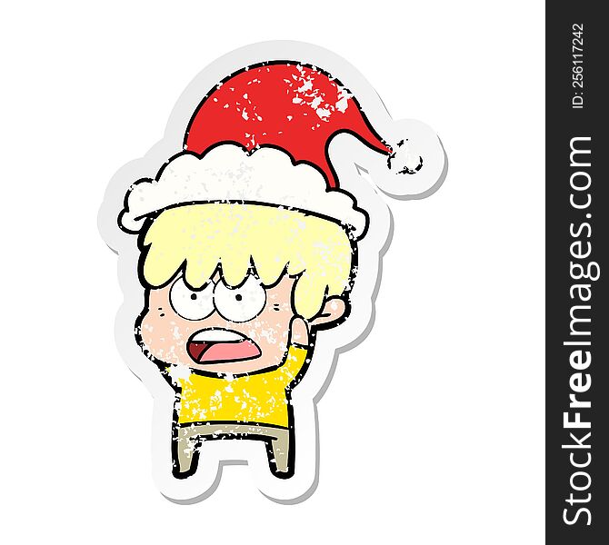 worried hand drawn distressed sticker cartoon of a boy wearing santa hat. worried hand drawn distressed sticker cartoon of a boy wearing santa hat