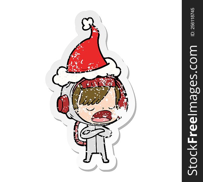 distressed sticker cartoon of a astronaut woman explaining wearing santa hat