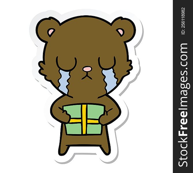 Sticker Of A Crying Cartoon Bear With Present