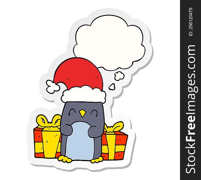 cute christmas penguin with thought bubble as a printed sticker