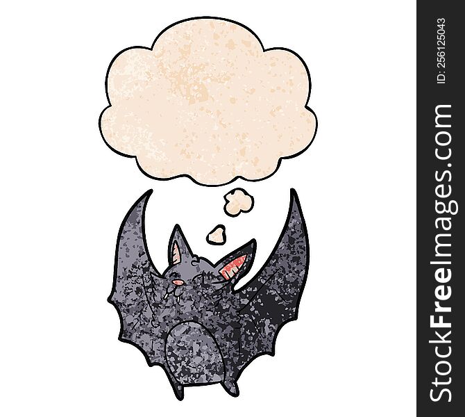 cartoon halloween bat and thought bubble in grunge texture pattern style