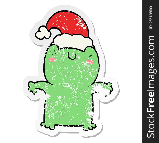 distressed sticker of a cute cartoon frog wearing christmas hat