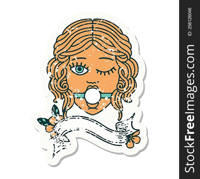 worn old sticker with banner of a winking female face wearing ball gag. worn old sticker with banner of a winking female face wearing ball gag
