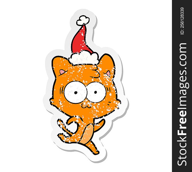 Distressed Sticker Cartoon Of A Surprised Cat Running Wearing Santa Hat