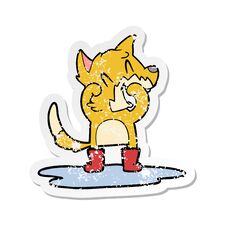 Distressed Sticker Of A Laughing Fox In A Puddle Stock Photo
