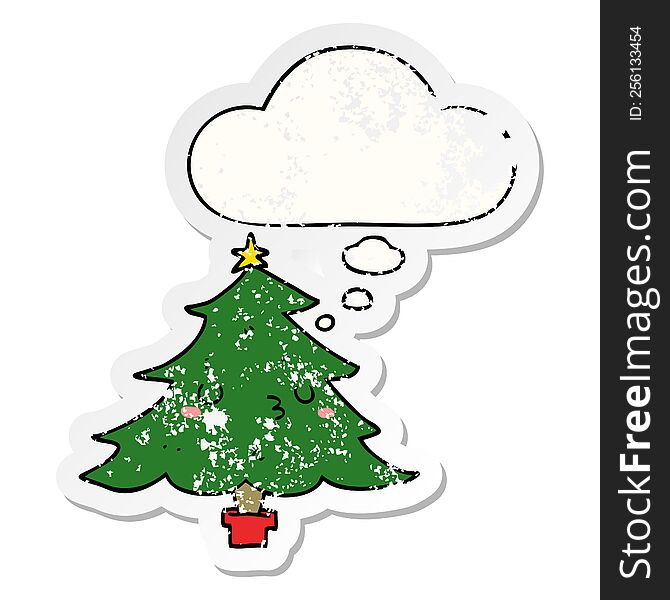 cute cartoon christmas tree with thought bubble as a distressed worn sticker