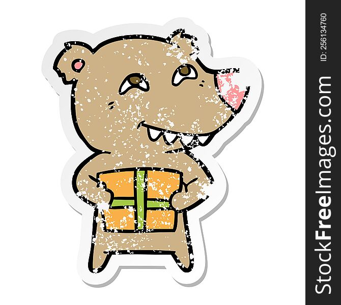 distressed sticker of a cartoon bear with present
