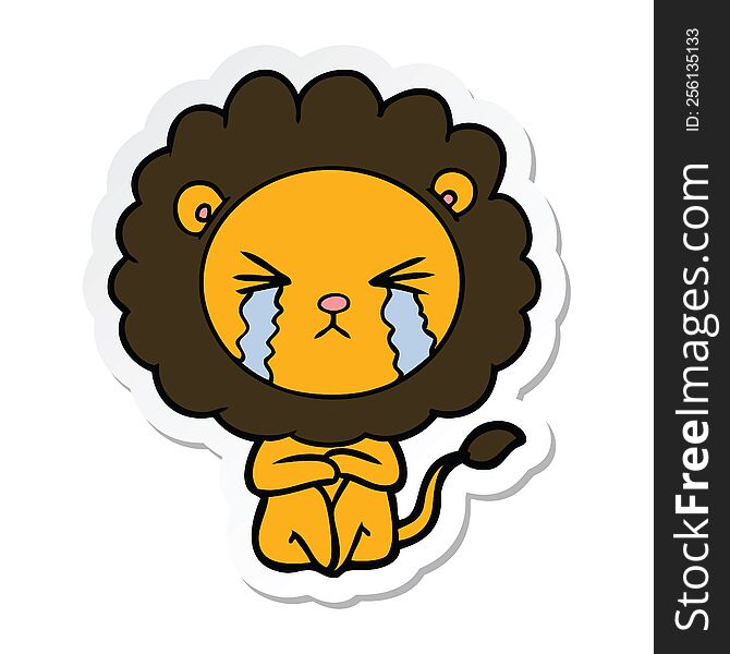 Sticker Of A Cartoon Crying Lion Sitting Huddled Up