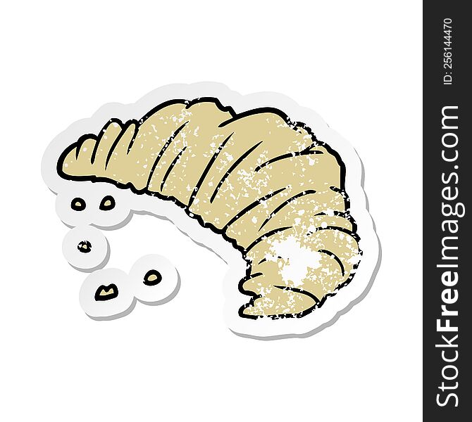 distressed sticker of a cartoon croissant