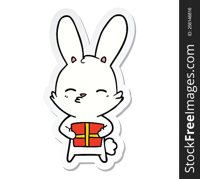 Sticker Of A Curious Bunny Cartoon With Present