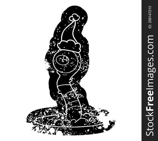 Cartoon Distressed Icon Of A Alien Swamp Monster Wearing Santa Hat