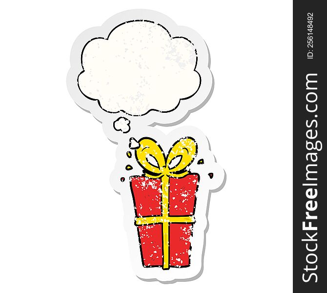 cartoon wrapped gift with thought bubble as a distressed worn sticker