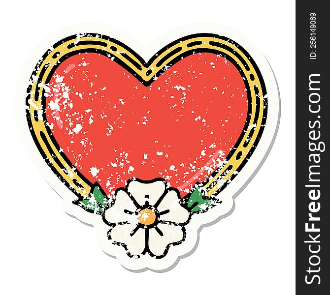 traditional distressed sticker tattoo of a heart and flower