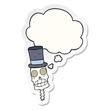Cartoon Spooky Skull And Thought Bubble As A Printed Sticker Royalty Free Stock Images