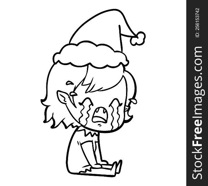 hand drawn line drawing of a crying vampire girl wearing santa hat