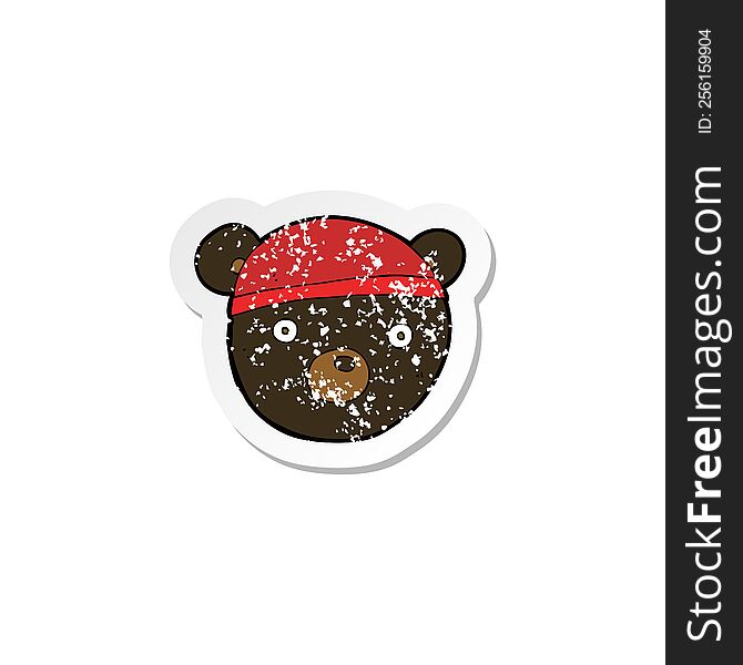 Retro Distressed Sticker Of A Cartoon Black Bear Cub Wearing Hat