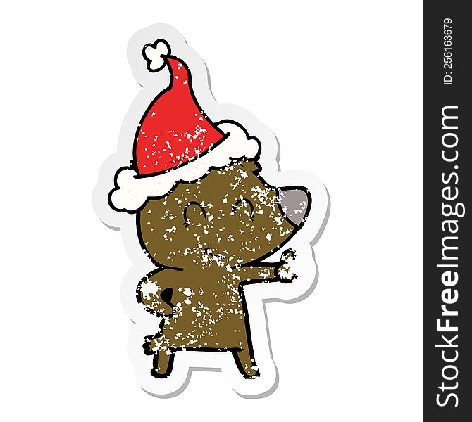 female bear hand drawn distressed sticker cartoon of a wearing santa hat. female bear hand drawn distressed sticker cartoon of a wearing santa hat