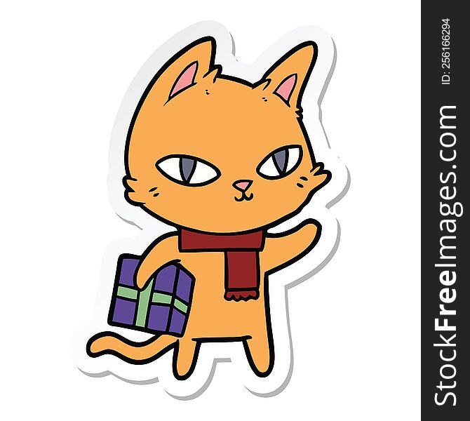 sticker of a cartoon cat with gift