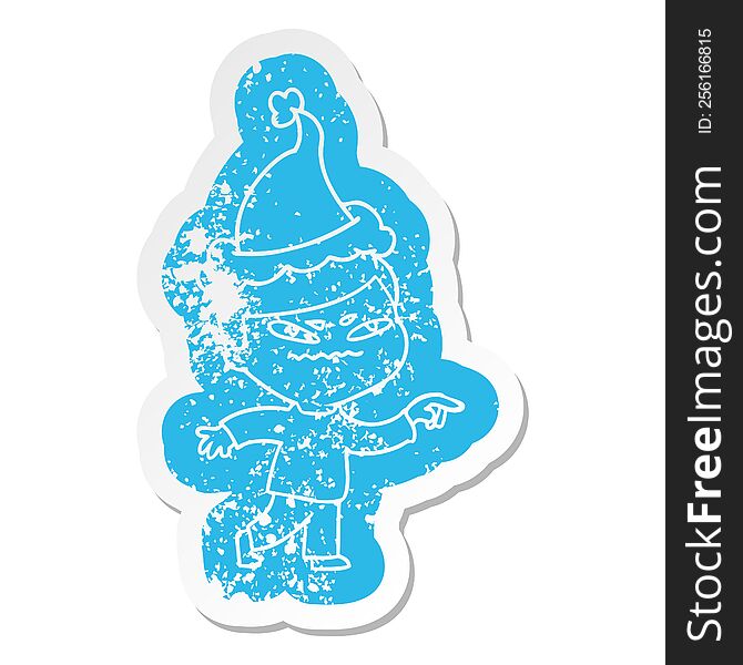 Cartoon Distressed Sticker Of A Angry Man Pointing Wearing Santa Hat