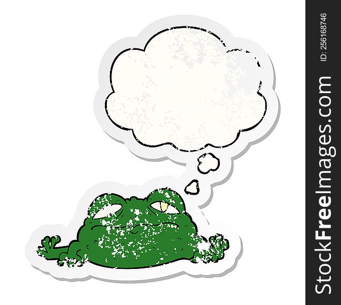 cartoon ugly frog with thought bubble as a distressed worn sticker