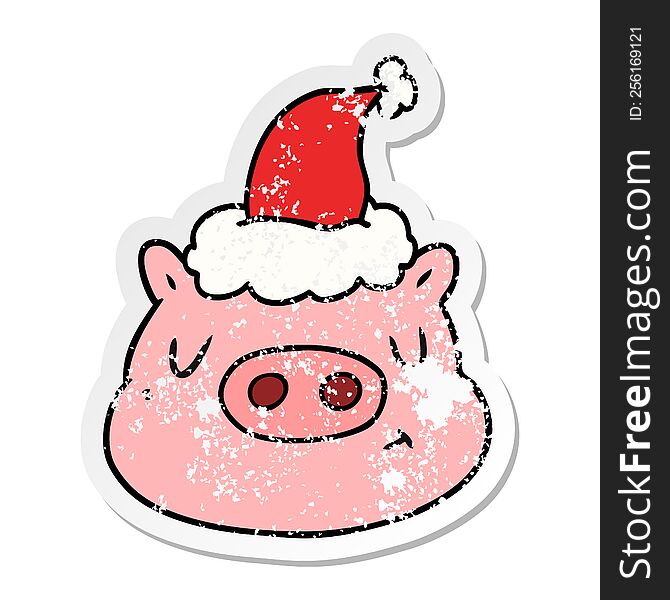 hand drawn distressed sticker cartoon of a pig face wearing santa hat