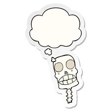 Cartoon Spooky Skull And Thought Bubble As A Printed Sticker Royalty Free Stock Image