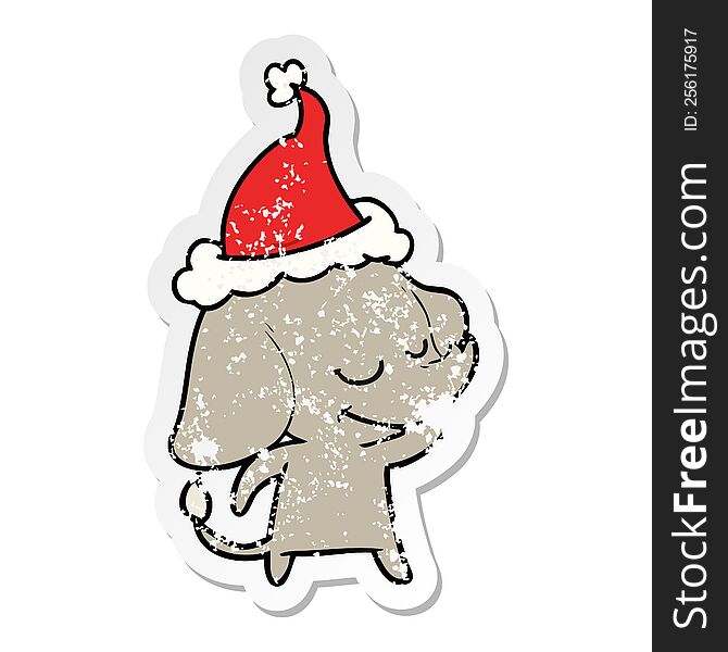 Distressed Sticker Cartoon Of A Smiling Elephant Wearing Santa Hat