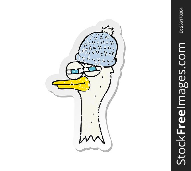 retro distressed sticker of a cartoon bird wearing hat