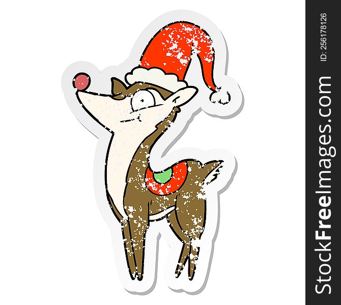 distressed sticker of a cartoon christmas reindeer