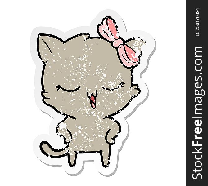 distressed sticker of a cartoon cat with bow on head and hands on hips