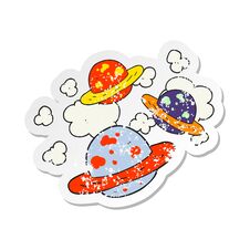 Retro Distressed Sticker Of A Cartoon Planets Royalty Free Stock Photo