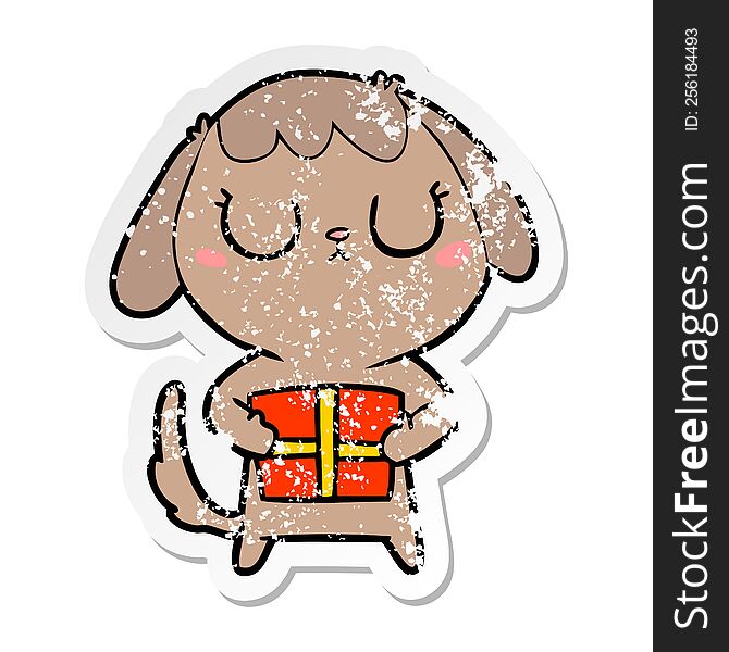 Distressed Sticker Of A Cute Cartoon Dog With Christmas Present