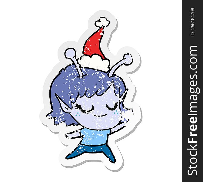 Smiling Alien Girl Distressed Sticker Cartoon Of A Wearing Santa Hat