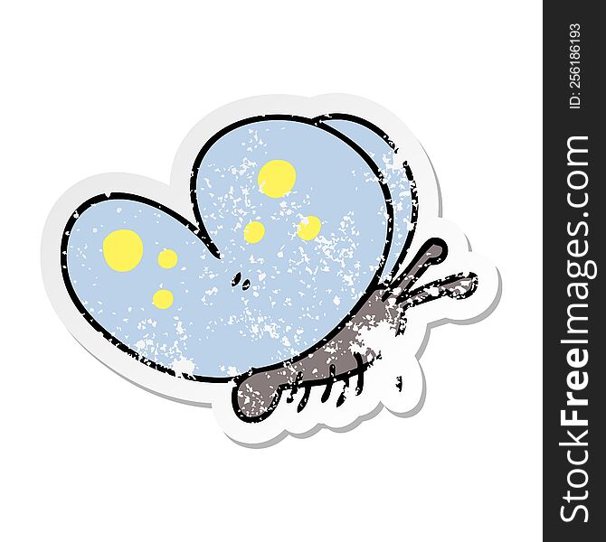 distressed sticker of a quirky hand drawn cartoon butterfly