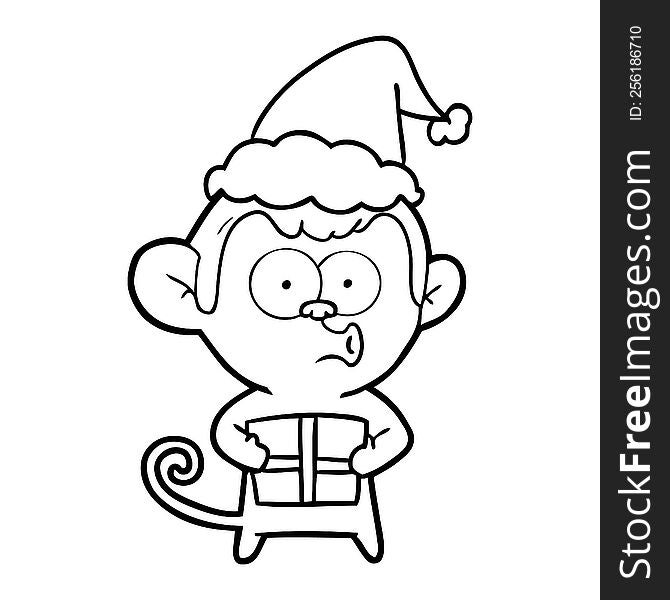 hand drawn line drawing of a christmas monkey wearing santa hat