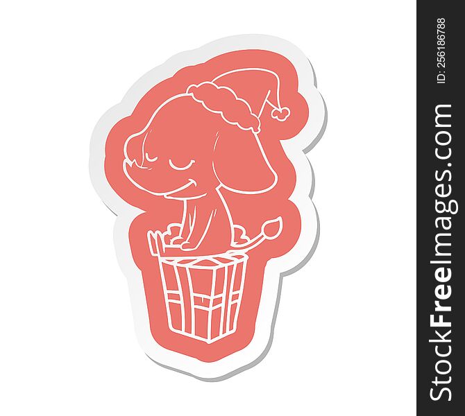 quirky cartoon  sticker of a smiling elephant wearing santa hat