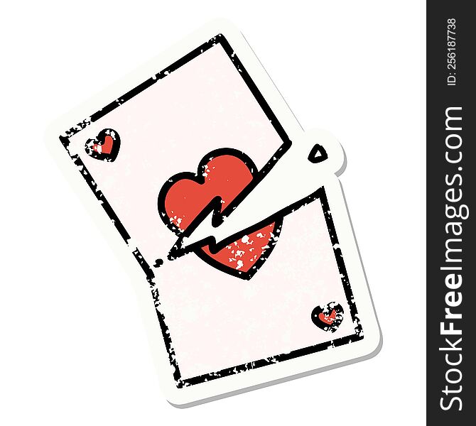 distressed sticker tattoo in traditional style of a torn card. distressed sticker tattoo in traditional style of a torn card
