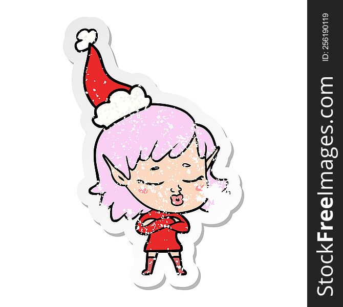 pretty hand drawn distressed sticker cartoon of a elf girl wearing santa hat