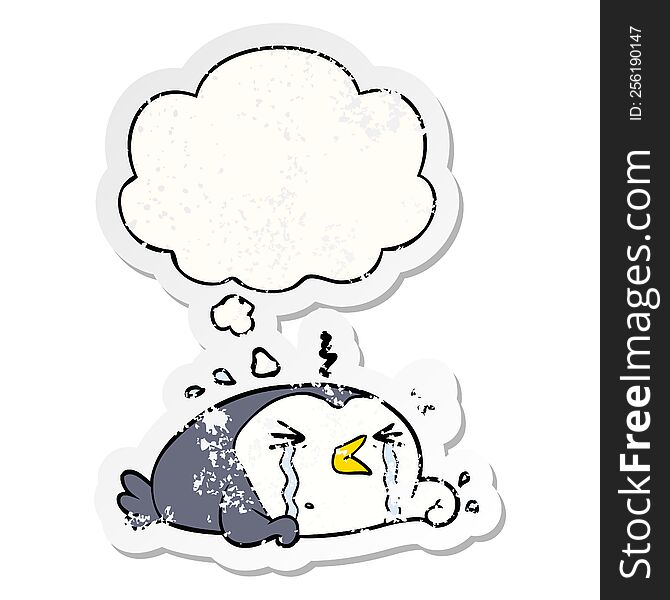 Cartoon Crying Penguin And Thought Bubble As A Distressed Worn Sticker