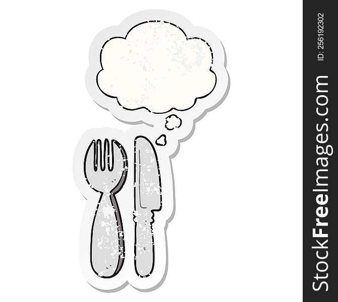 cartoon knife and fork and thought bubble as a distressed worn sticker