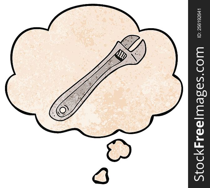 Cartoon Spanner And Thought Bubble In Grunge Texture Pattern Style