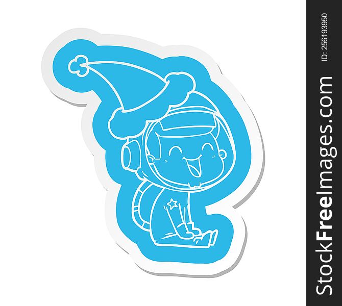 happy quirky cartoon  sticker of a astronaut wearing santa hat