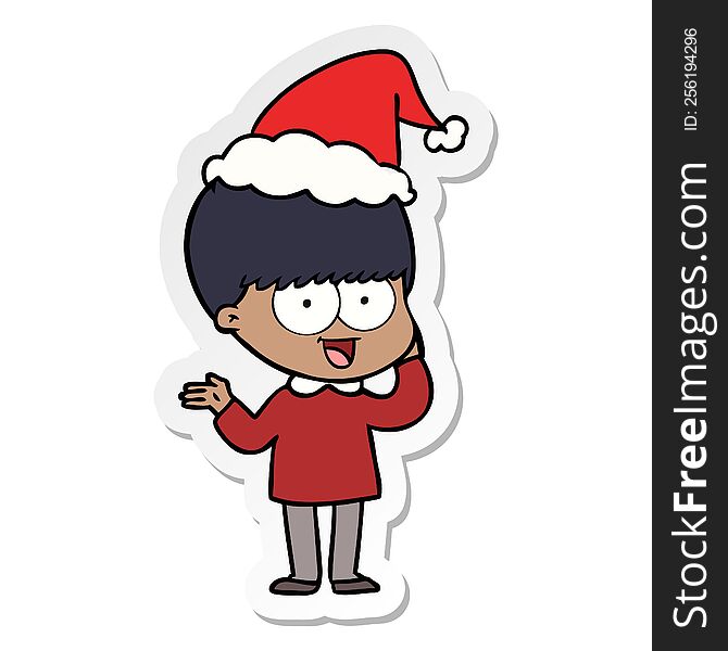 happy hand drawn sticker cartoon of a boy wearing santa hat. happy hand drawn sticker cartoon of a boy wearing santa hat